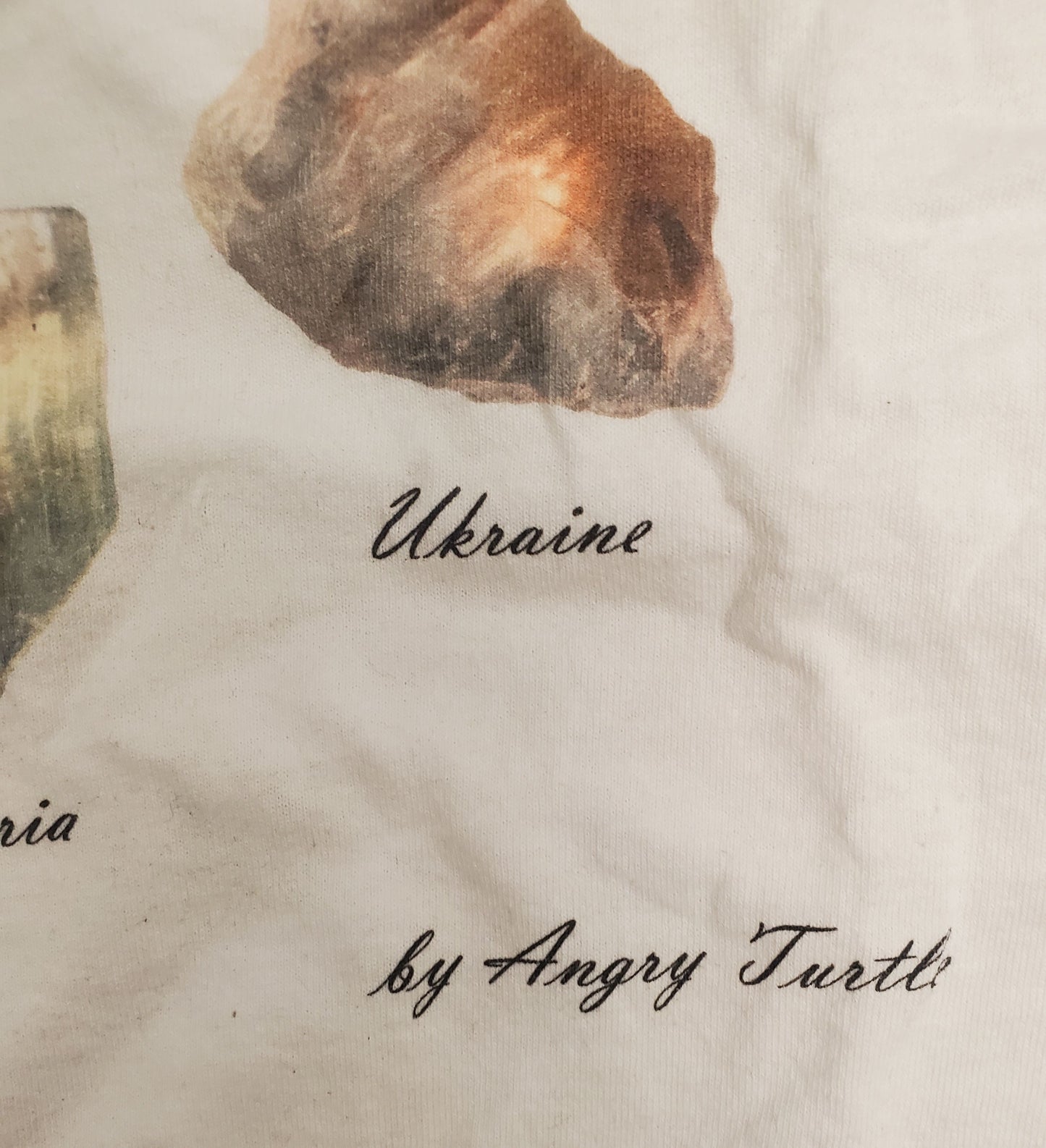 Topaz Of The World Crystal T-Shirt by Angry Turtle