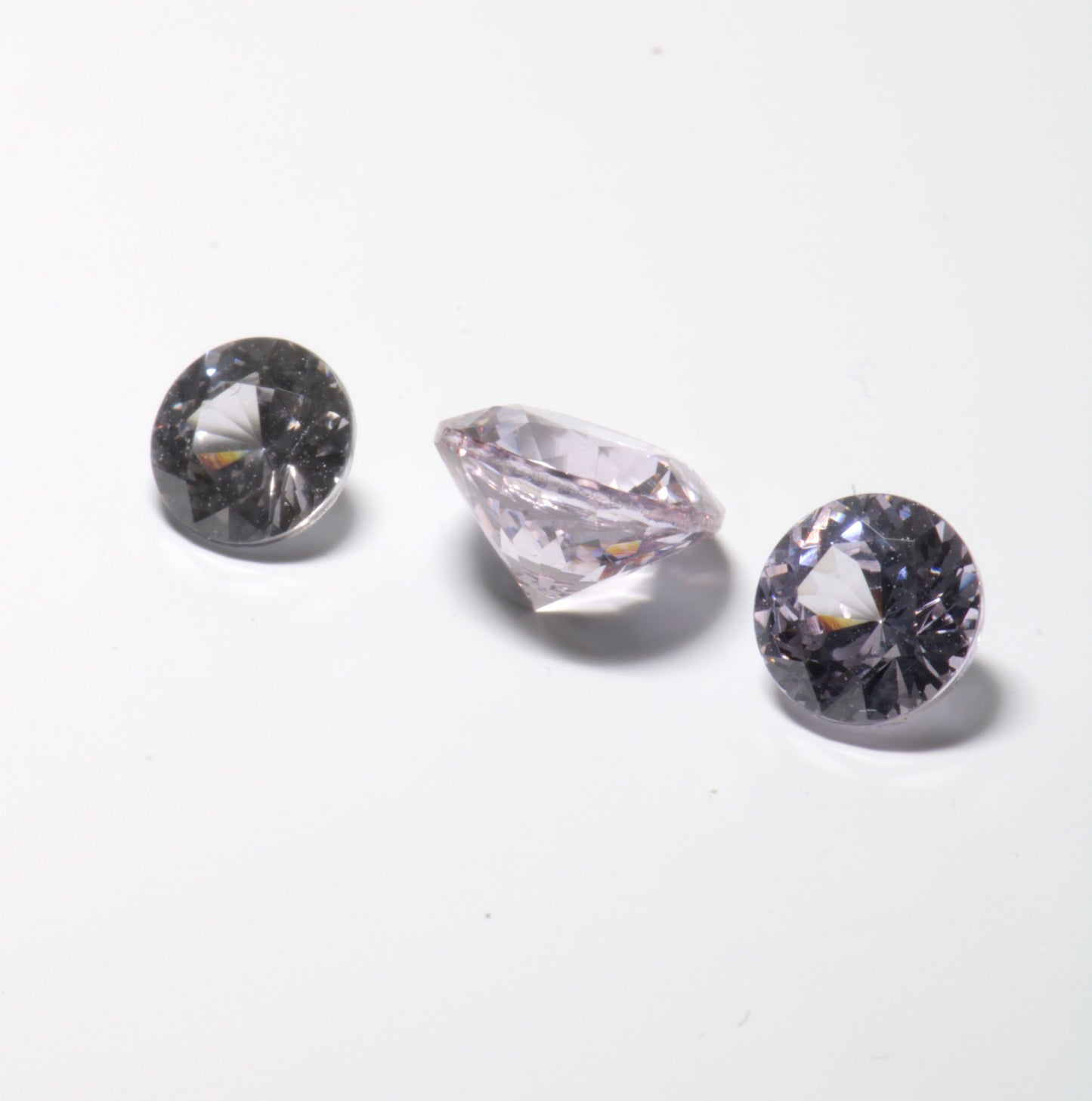 Pink Laser Garnet, Nd+ YAG in Violet, Pink and Peach