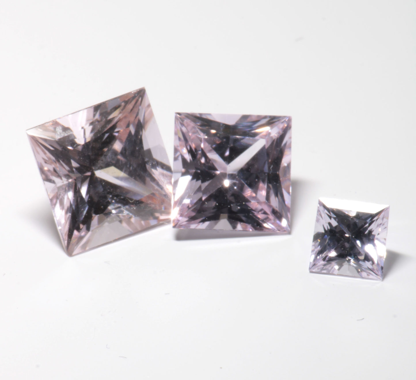 Pink Laser Garnet, Nd+ YAG in Violet, Pink and Peach