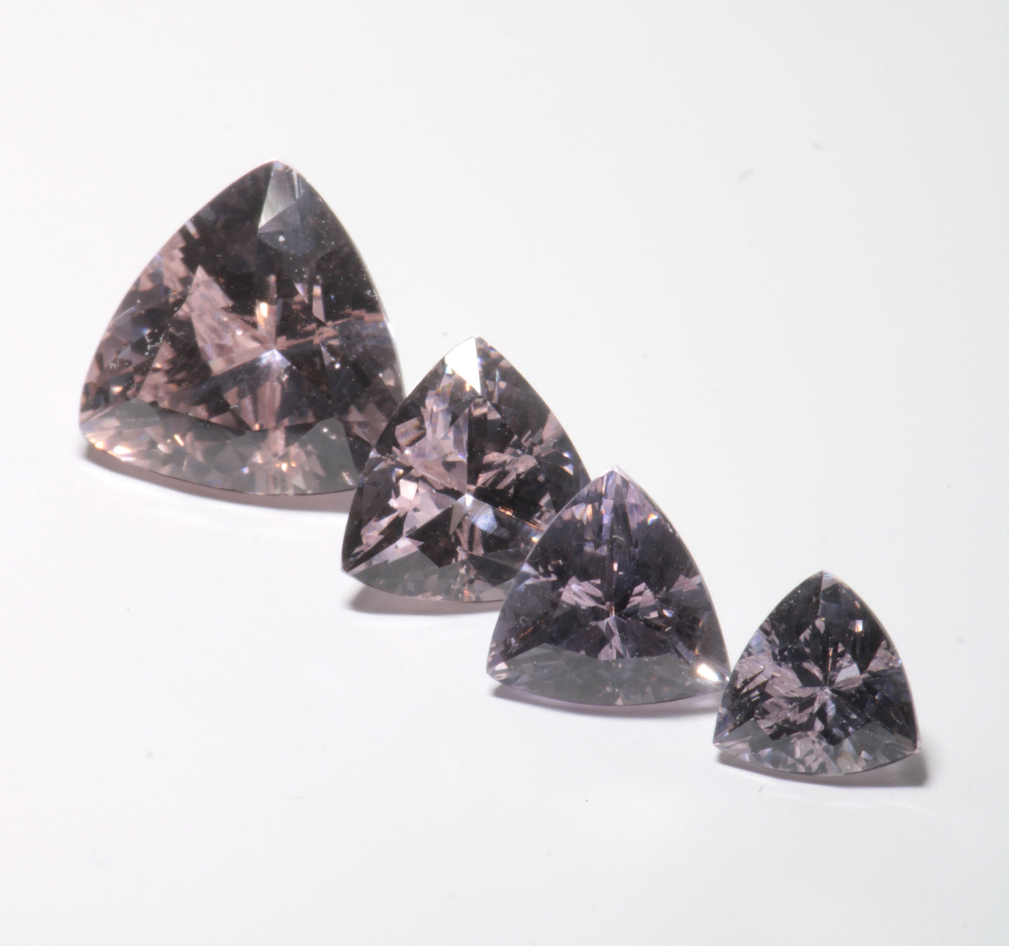 Pink Laser Garnet, Nd+ YAG in Violet, Pink and Peach
