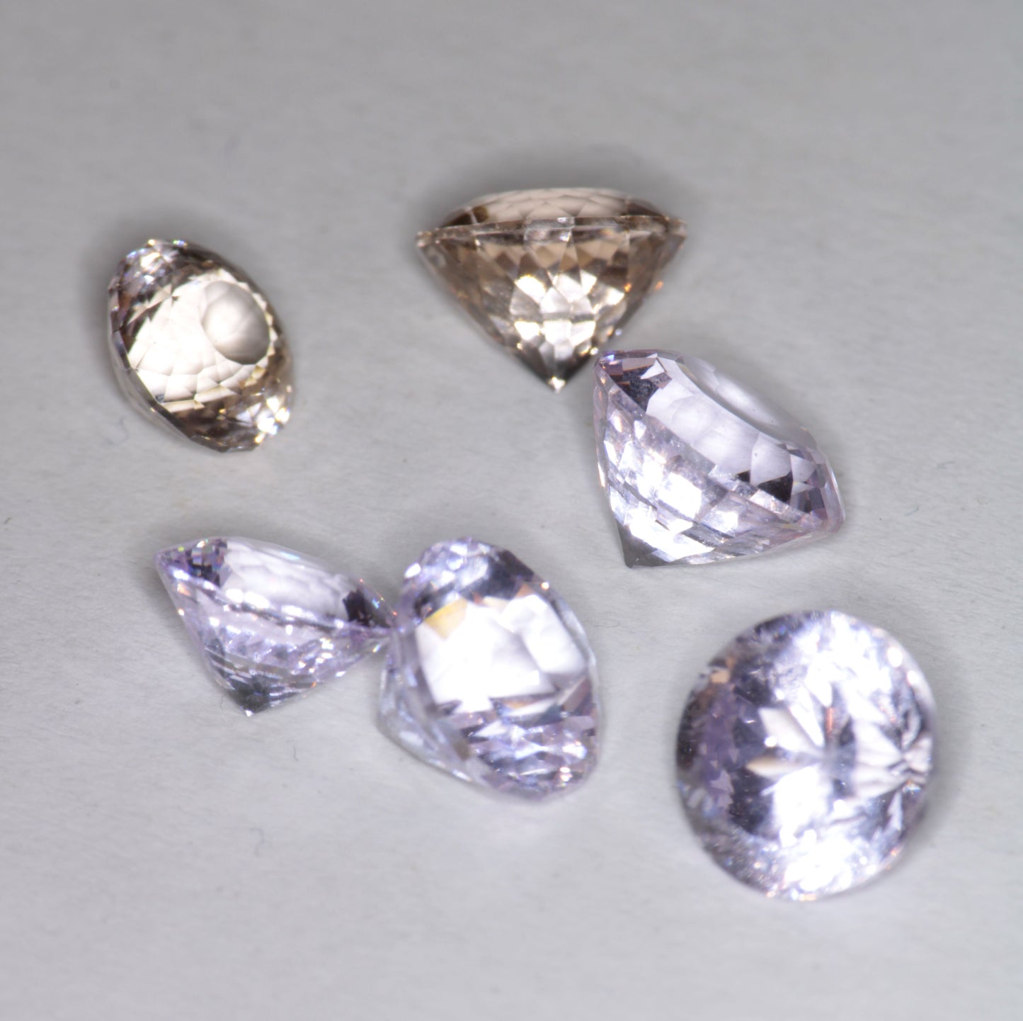 Pink Laser Garnet, Nd+ YAG in Violet, Pink and Peach