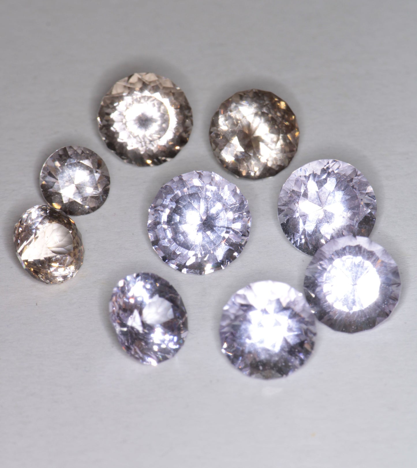 Pink Laser Garnet, Nd+ YAG in Violet, Pink and Peach