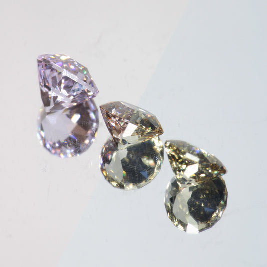 Pink Laser Garnet, Nd+ YAG in Violet, Pink and Peach