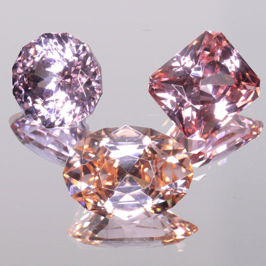 Lab Perovskite Cut Gems, Pink to Orange Red Laser YAP