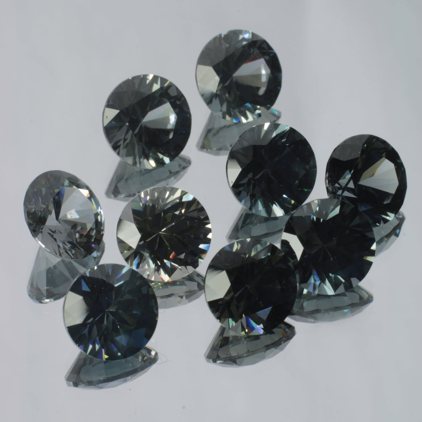 Dusk Garnets under CFL light, showing a range of different bluish and greenish shades.