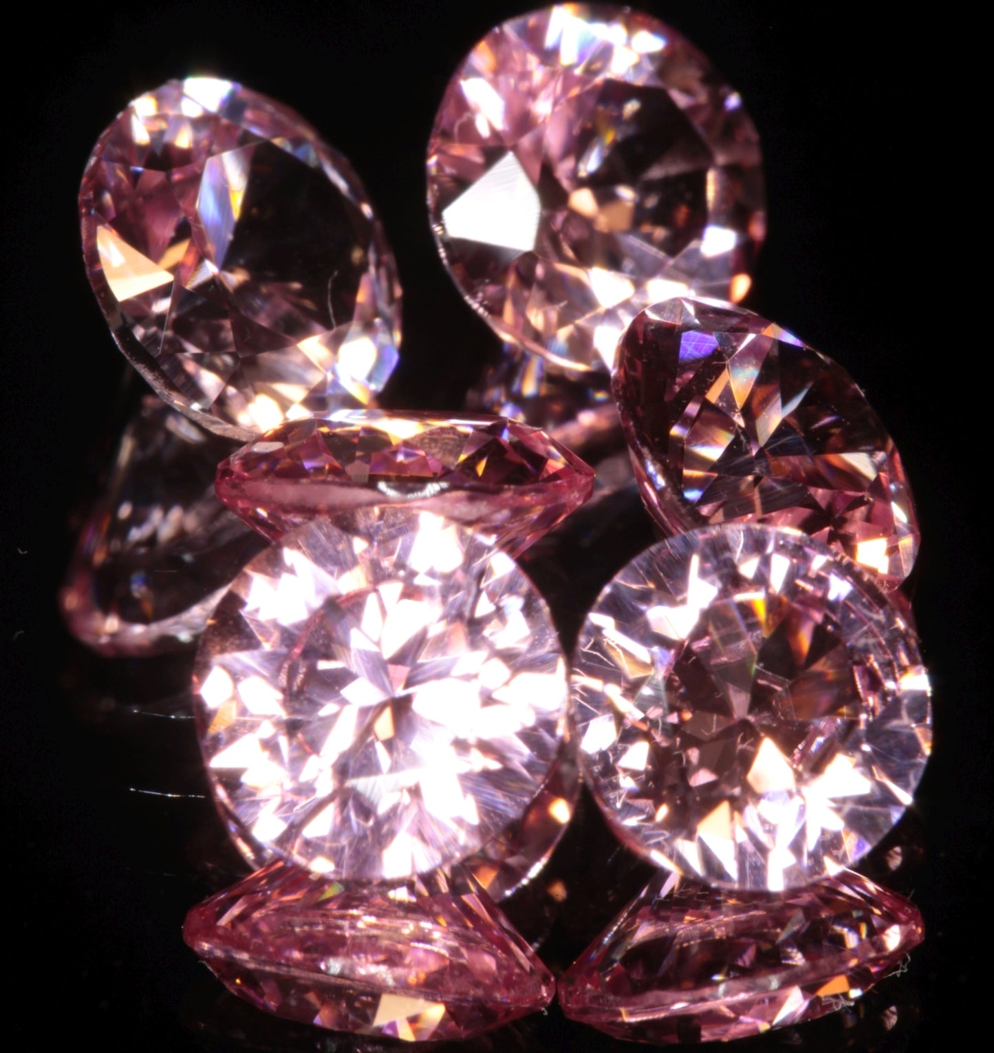 Calibrated Titanium Laser Sapphires, Clean and Bubbly "Strawberry" Sapphires