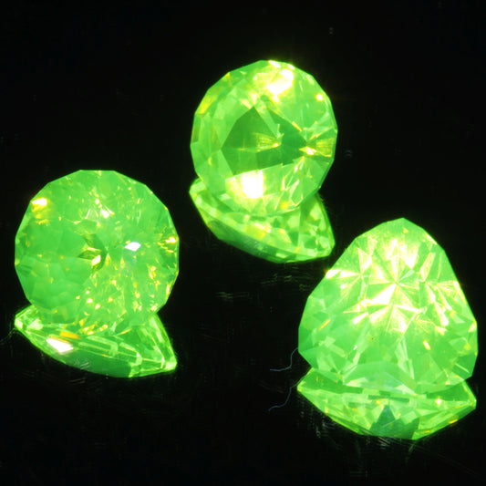 Green glowing LuAG lumogarnet gemstones