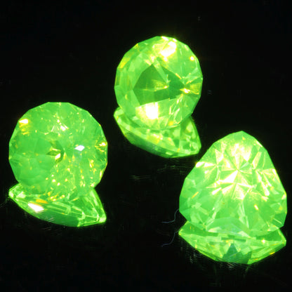 Green glowing LuAG lumogarnet gemstones