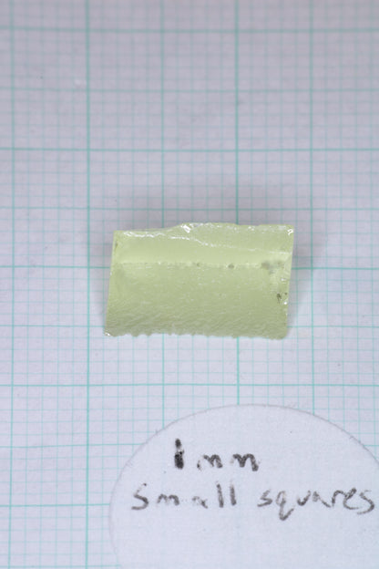 Ghost Garnet aka Pr:LuAG Lumogarnet Facet Rough Green with Orange Glow
