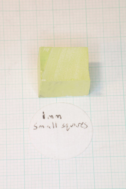 Ghost Garnet aka Pr:LuAG Lumogarnet Facet Rough Green with Orange Glow